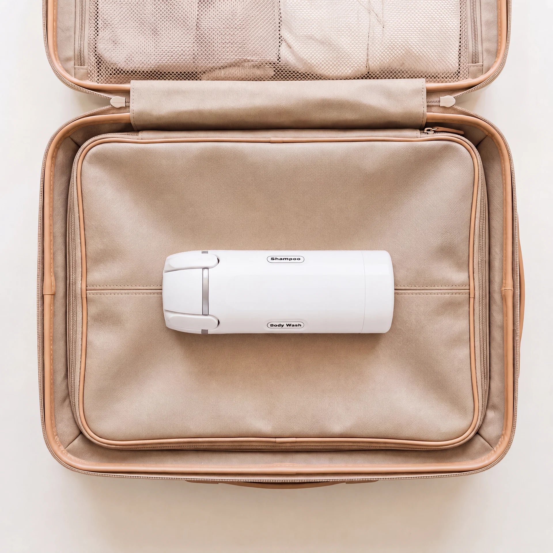 
          4-in-1 dispenser on a travel suitcase
        
